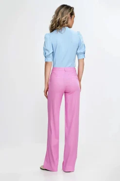Spodnie bootcut z kieszeniami - różowe